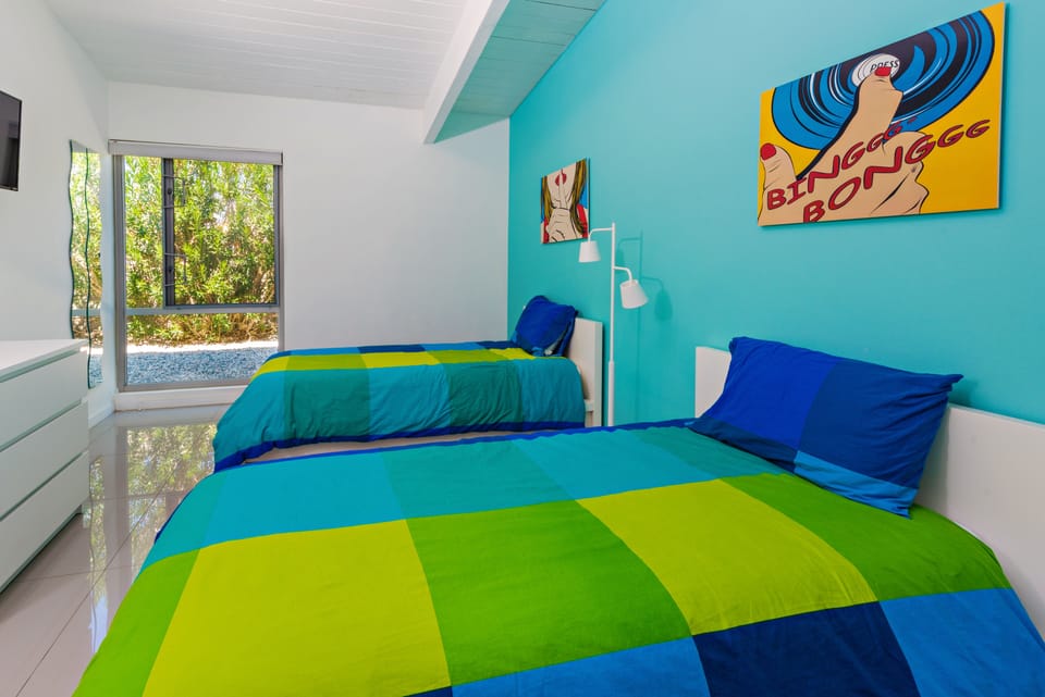 guest bedroom with twin beds