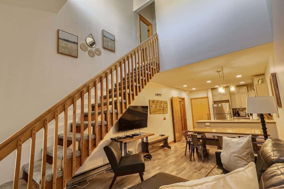 Main Living Area : Open living, dining, and kitchen area designed for relaxation and entertainment after a day filled with outdoor adventures. 