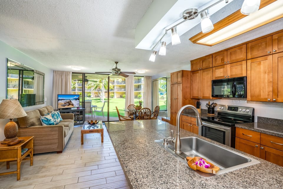 Bright and open living and kitchen area. We now have a sectional sofa, no images