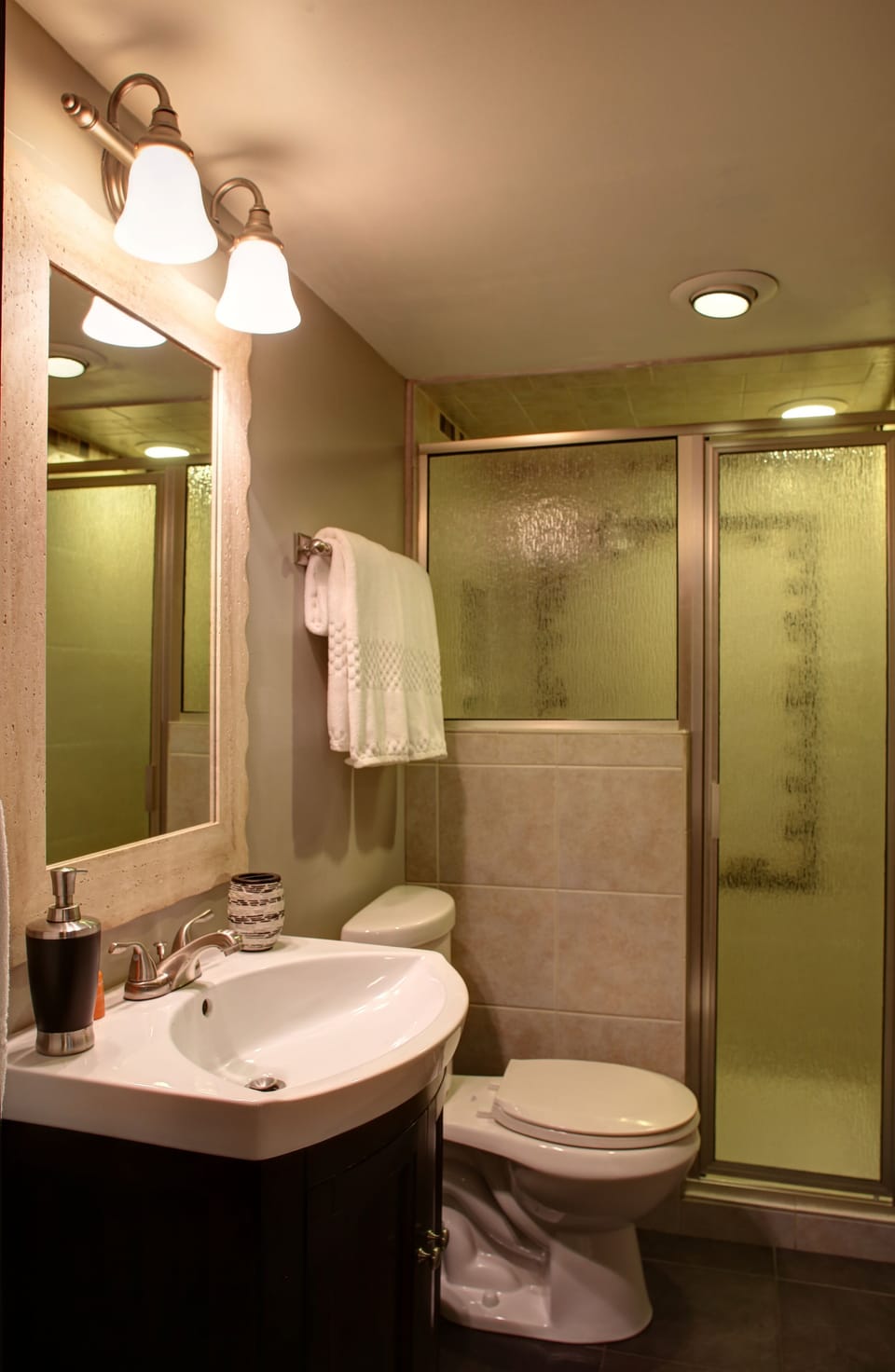 Bathroom with tile shower 