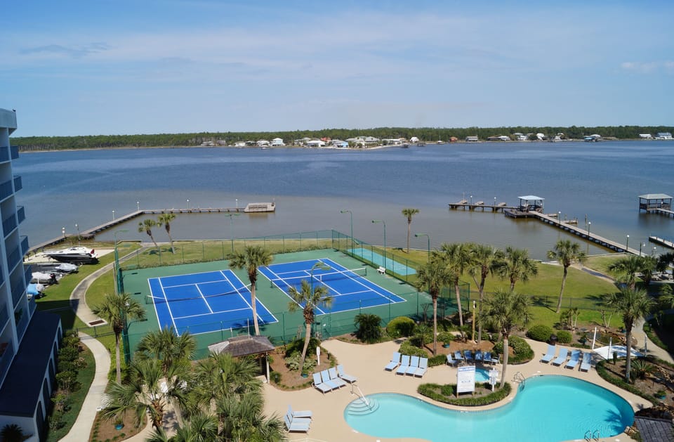 Our pool, tennis courts and our piers on the left and right.
