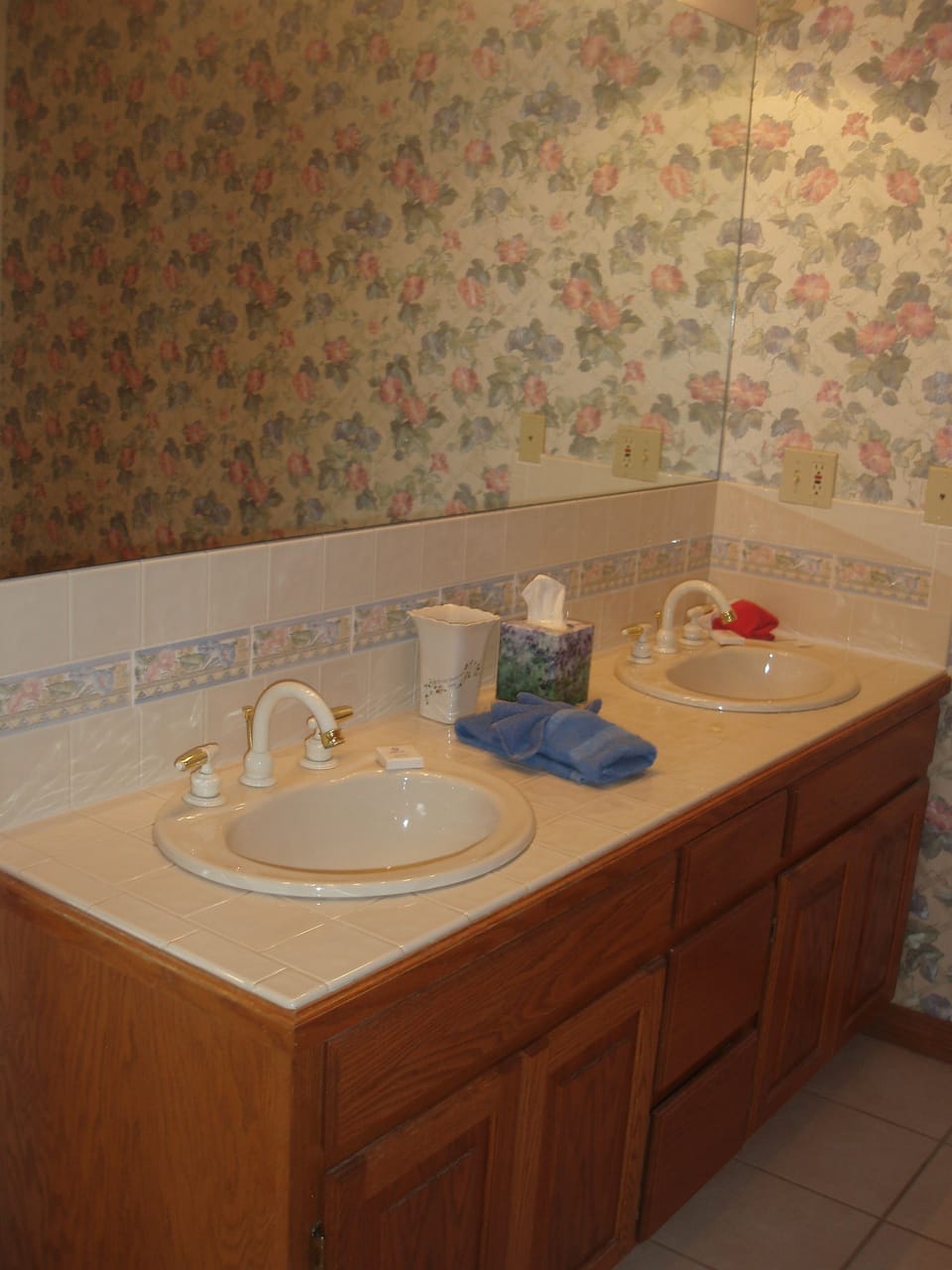 Upstairs Master Bath with double sink. Also has whirlpool tub with shower.