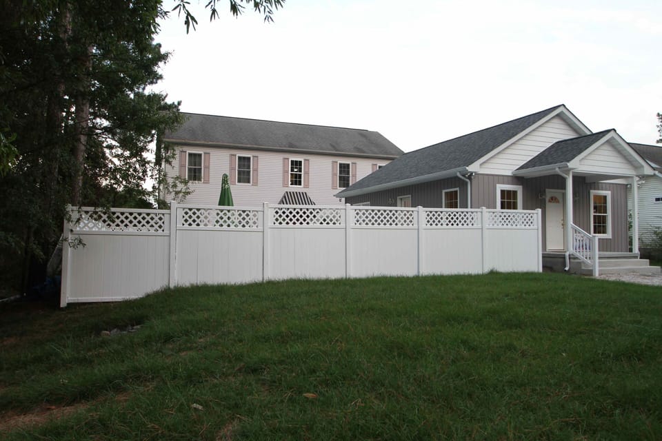 Main house in rear and caretakers cottage in foreground.