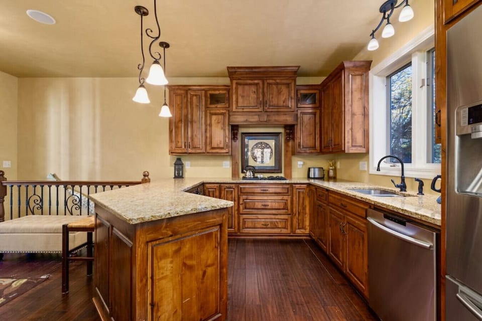 Stocked Kitchen With Stainless Appliances