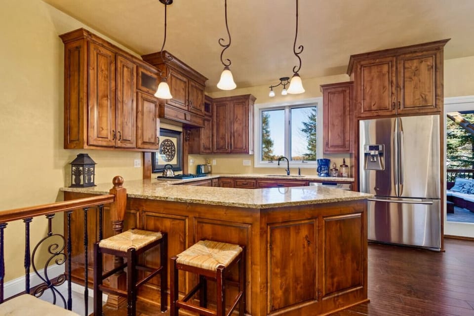 Stocked Kitchen With Stainless Appliances