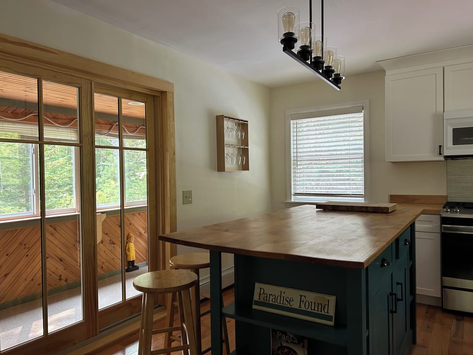 French doors in kitchen lead out to the back