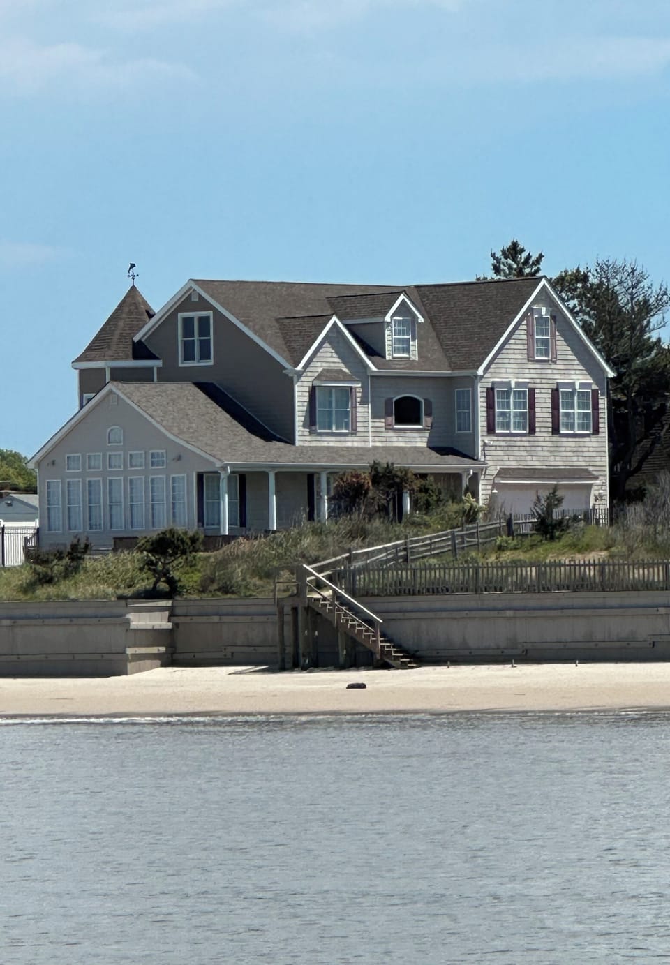 Houseview from water with  beach access  3 car driveway  additional street park