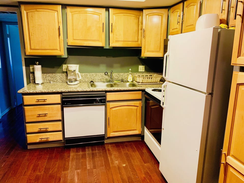 Inside the drawers and cupboards are the utensils, plates, bowls, glasses, etc.