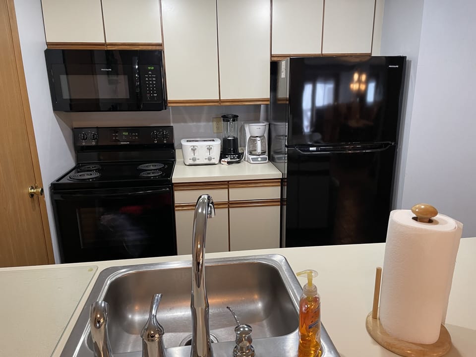 In addition to major appliances, there is a toaster, blender and Mr. Coffee.