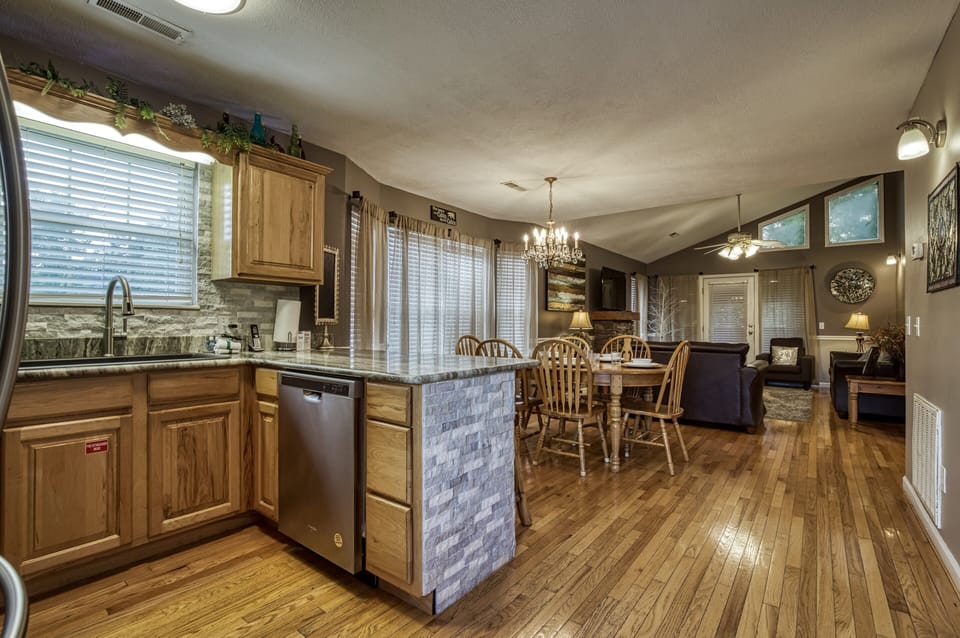 Vacation Rental in the Smokies "Striking Waters" - Kitchen, dining room, and living room