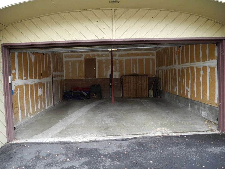 Garage is 15'7"W x 6'7"H x 20'D
