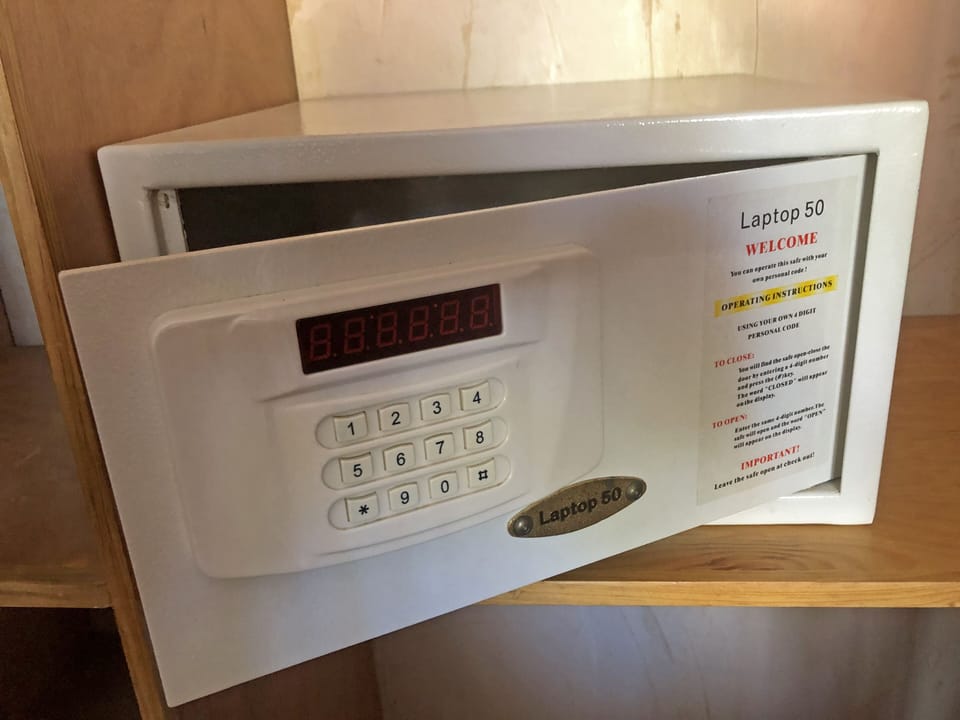 Both bedrooms feature in-room electronic safes.