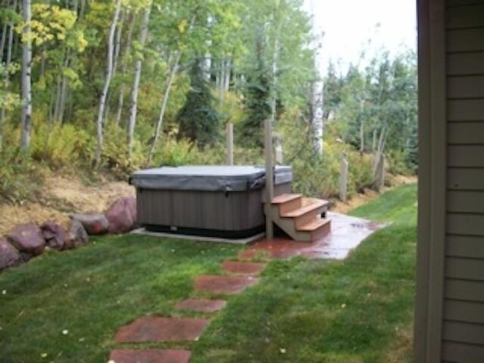 Back patio and hot tub.