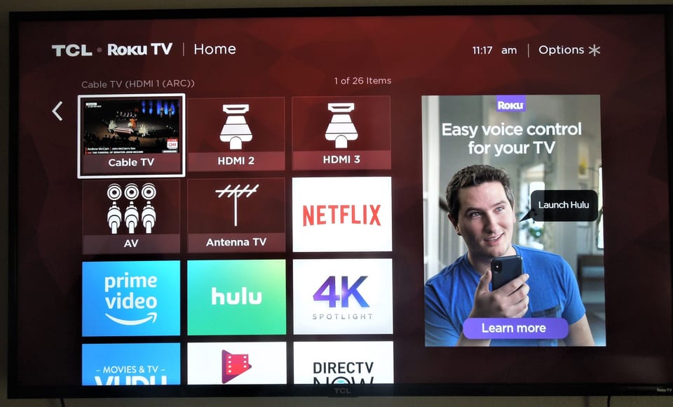  55" Smart TV with 220 Channel Cable, free Roku.