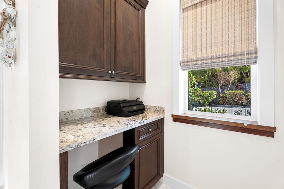 Work with a view in this cozy office nook, perfect for remote work or planning trips.