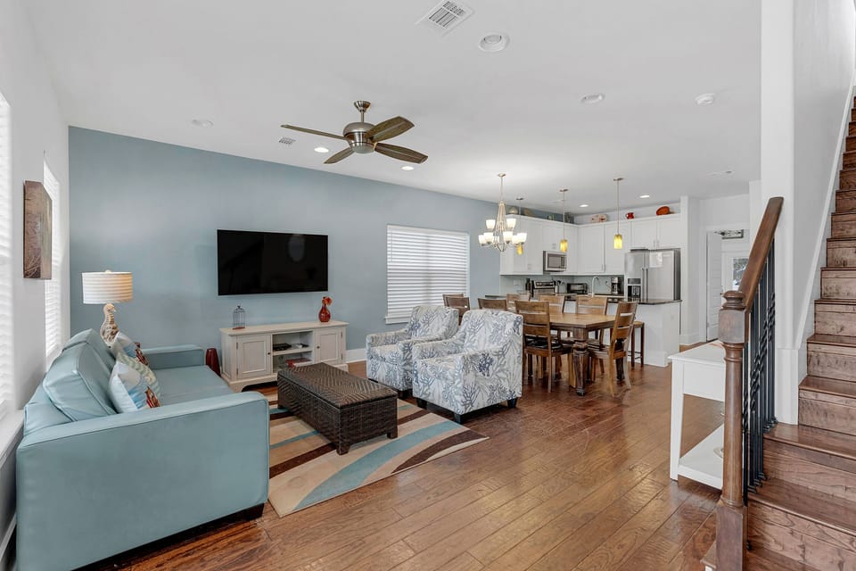 Open floor plan - main floor living area leading to dining area and kitchen.