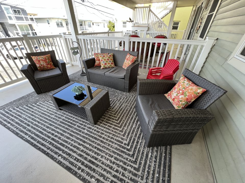 Covered porch with comfortable lounge area