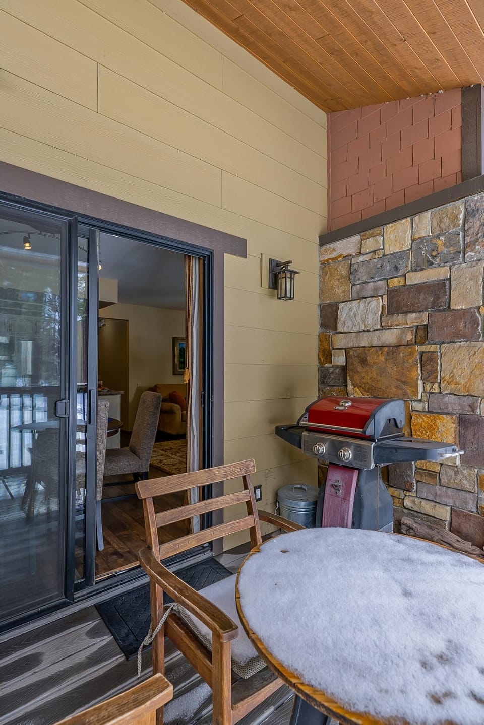 Light up the BBQ on the flagstone-walled garden courtyard, complete with a frost-kissed bistro set ready for spring thaws.