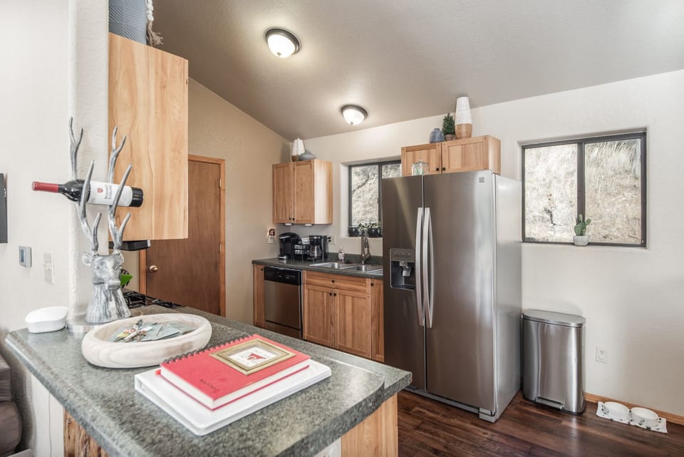 The kitchen is fully equipped with coffee makers, coffee filters & pods.