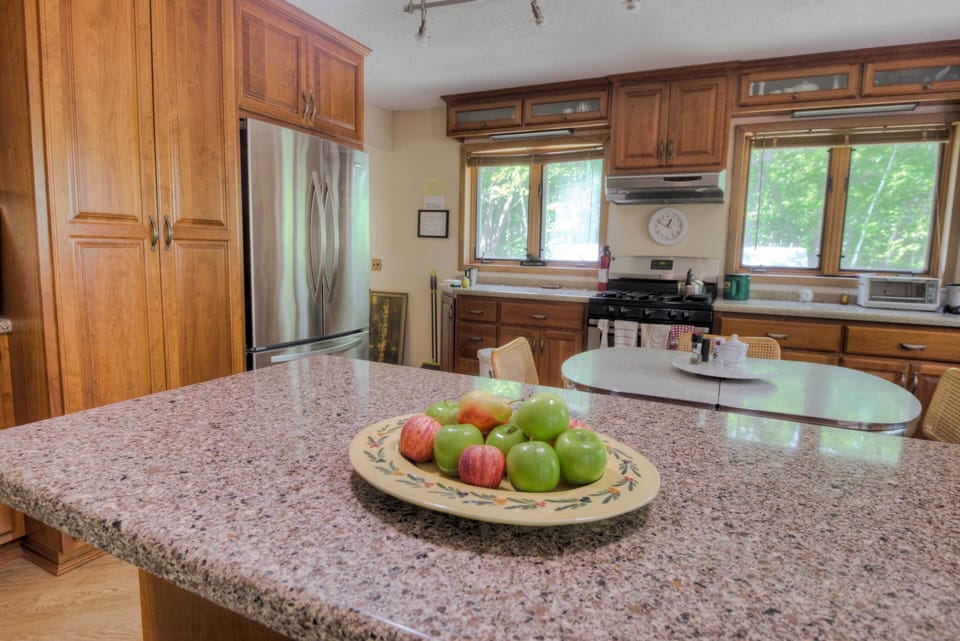 Fully equipped kitchen with gas stove and quiet dishwasher. Island work area.
