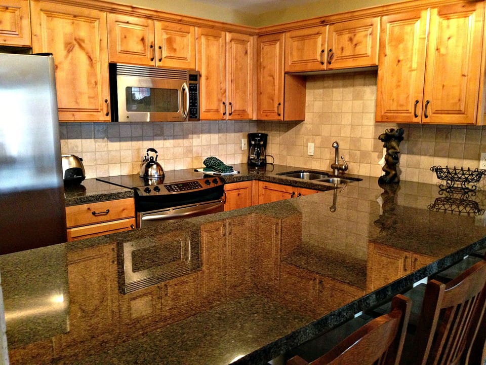 Dishwasher; glass-top electric stove, microwave; Refrigerator, small appliances