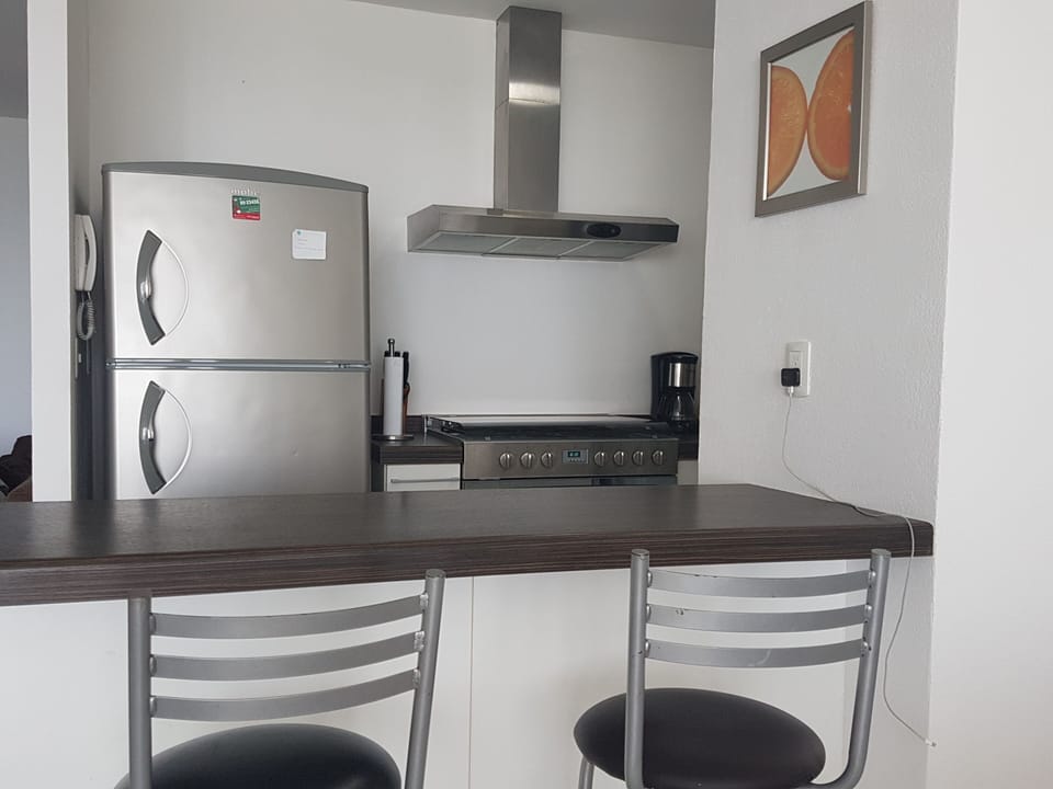 Another view of the kitchen area