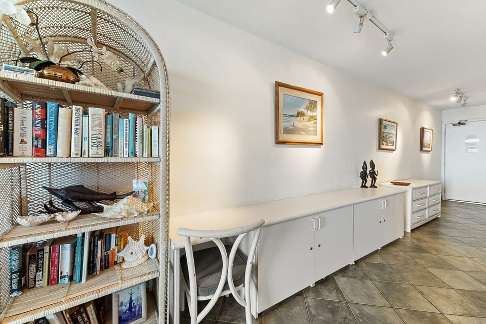 Entry hallway with built in buffet with cabinets and a full set of dresser drawers.