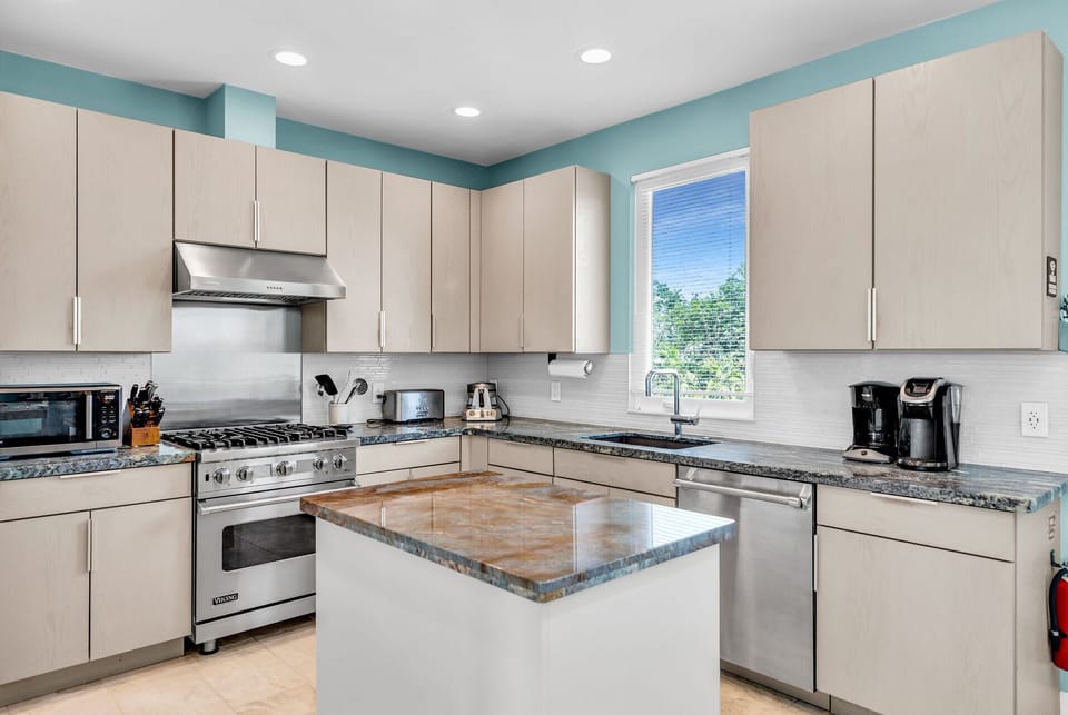 Viking gas stove & a Thermador refrigerator