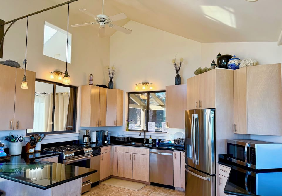 Kitchen has many amenities including 12 cup coffeemaker and Keurig coffeemaker.