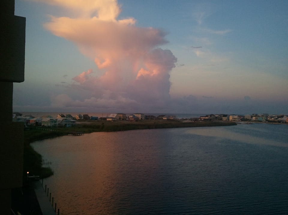 View toward the south from  balcony.Gulf of Mexico is visible across the road.