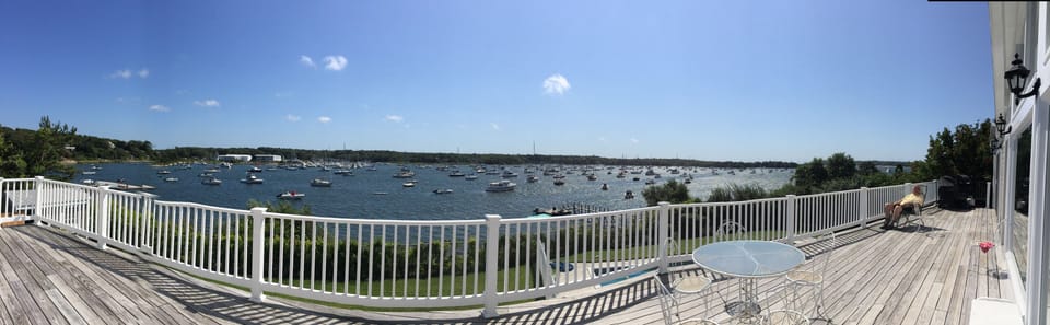 Huge decks w/breathtaking views overlook Swimming Pool, Harbor, Ass. Dock  Beach
