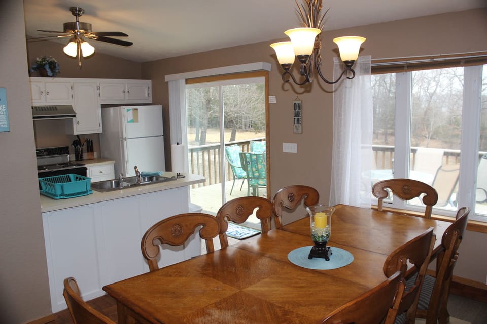 Large dining table next to the kitchen