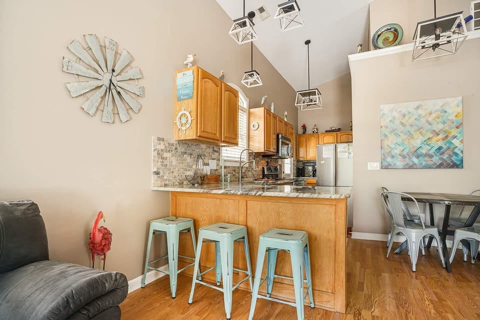 Cozy kitchen with breakfast bar and vibrant seating