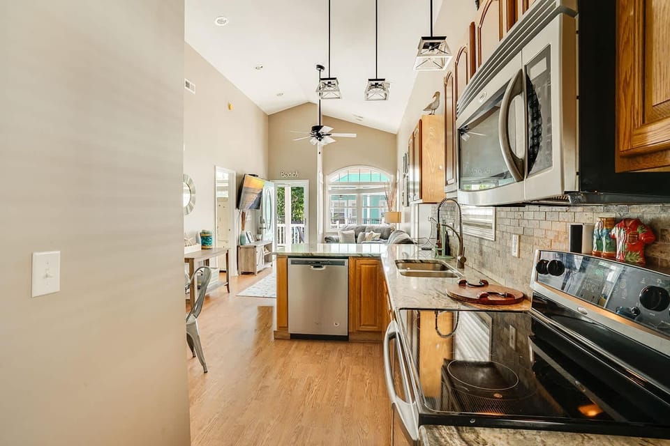 Bright, open kitchen with modern appliances and island seating