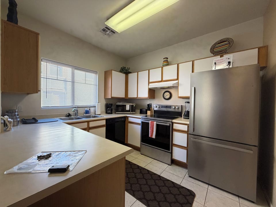 Kitchen with new appliances and icemaker