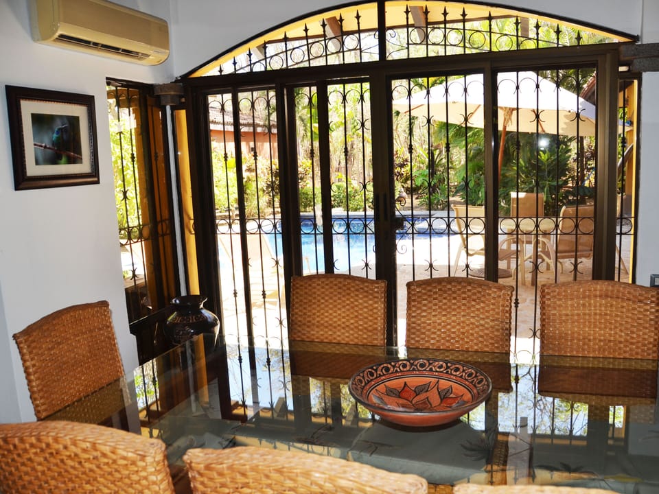 Dining Area looking out to the pool.