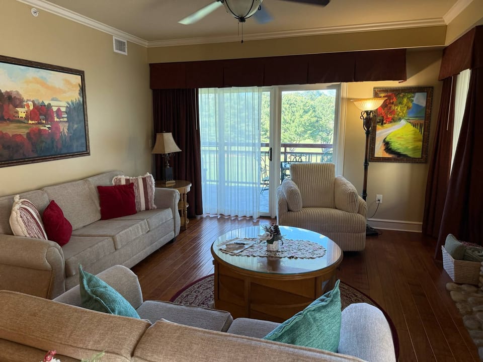Spacious living room with queen size sleeper sofa.