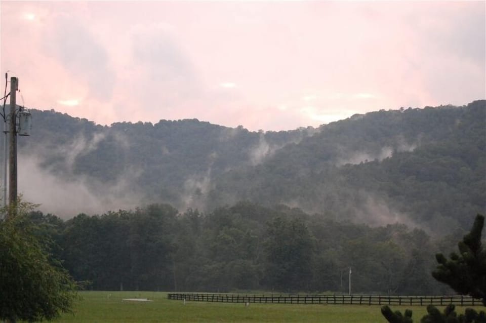 Spectacular sunsets! Beautiful year round mountain views from wrap-around porch