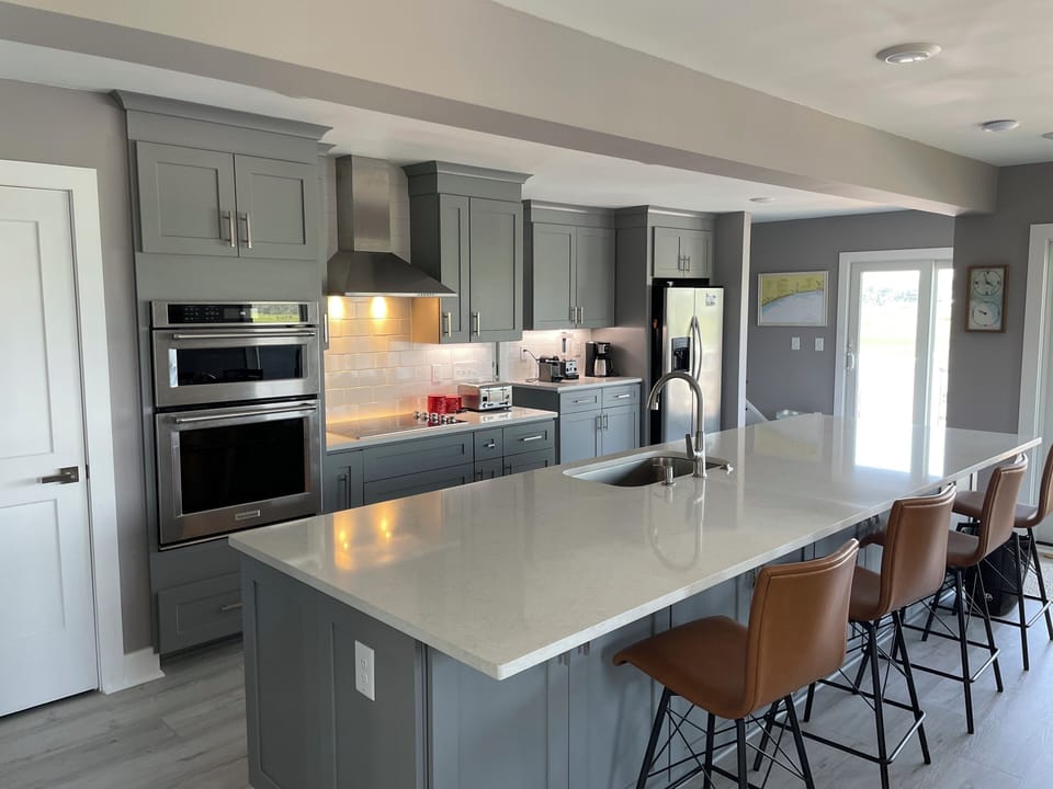Microwave, oven, electric cook top, high speed vent hood.