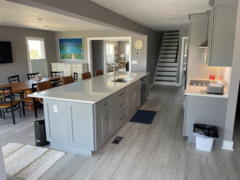 12' kitchen island - main staircase - 5 bedrooms upstair - one bedroom down