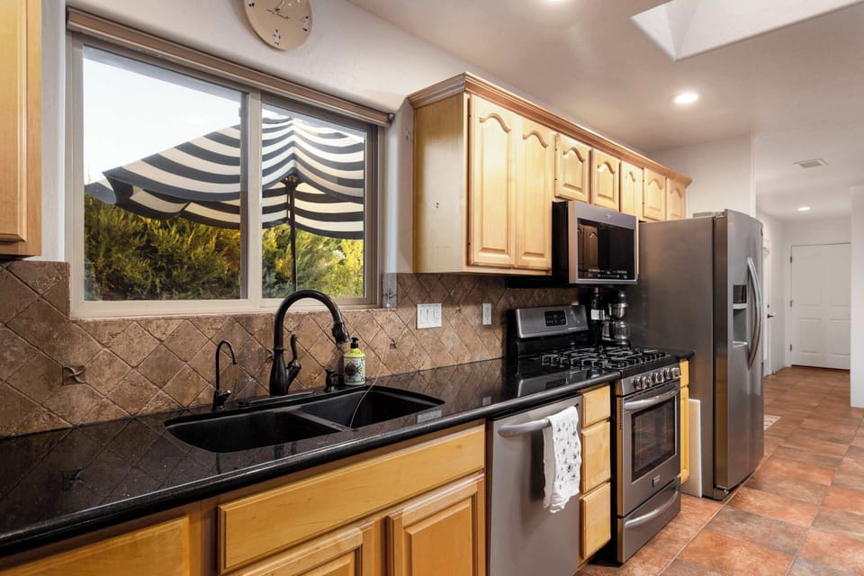 Bright and cheerful kitchen corner with all the essentials for a delightful cooking experience.