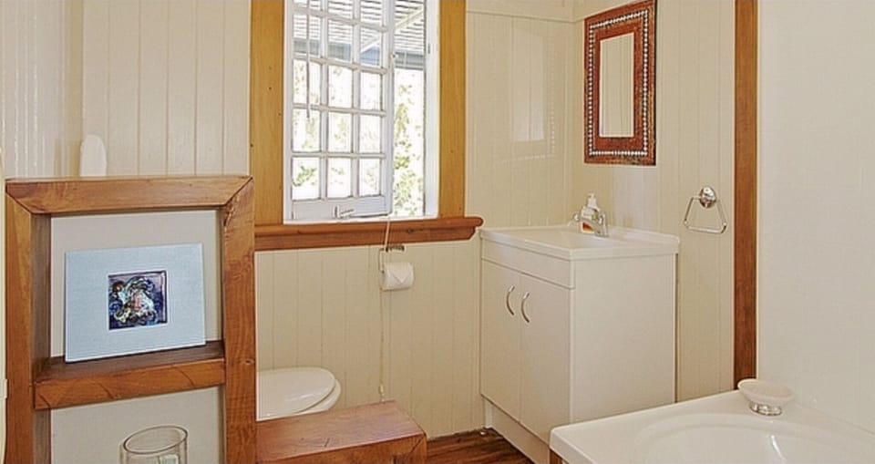 bathroom with bath and shower (over bath)