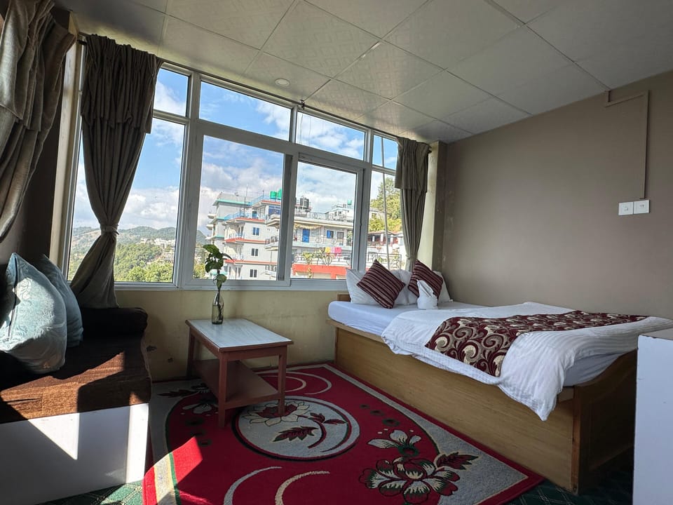 Deluxe Room | Iron/ironing board, rollaway beds, free WiFi, bed sheets