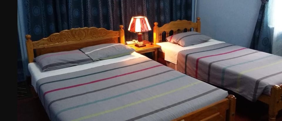 Down comforters, blackout drapes, iron/ironing board, bed sheets