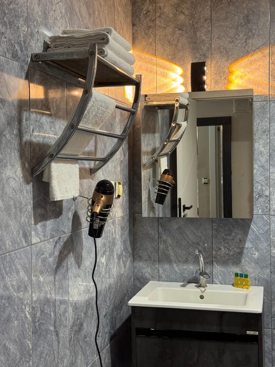 Shower, free toiletries, hair dryer, slippers