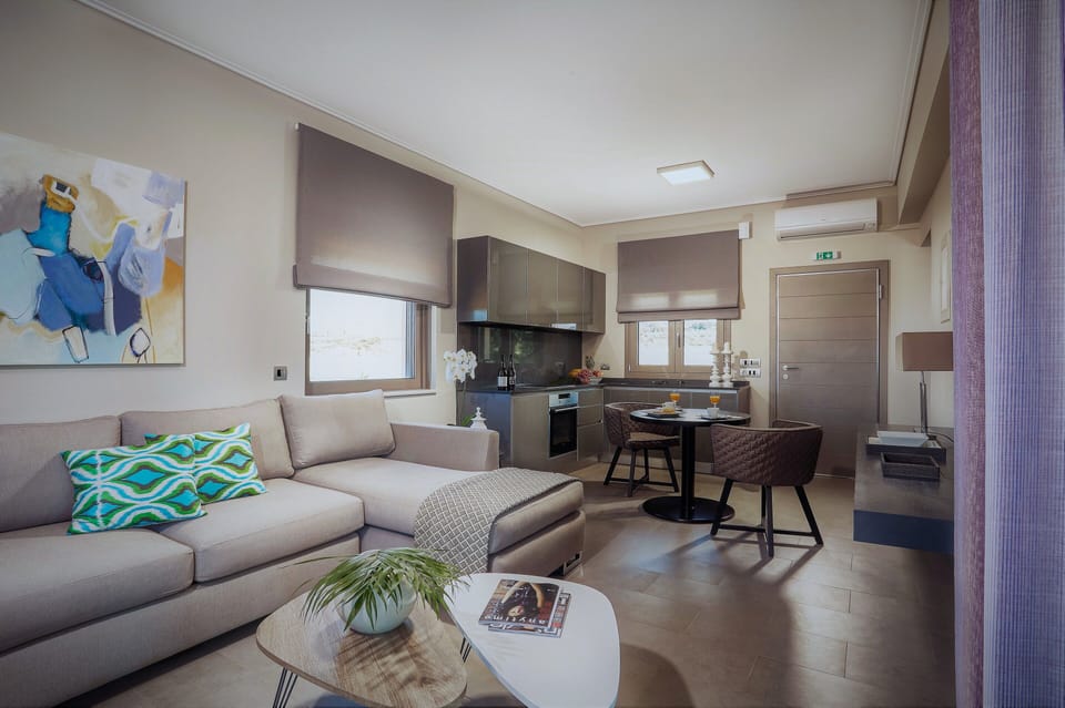 Deluxe Apartment, 1 Bedroom, Non Smoking (Family) | Living area | 40-inch flat-screen TV with satellite channels, TV