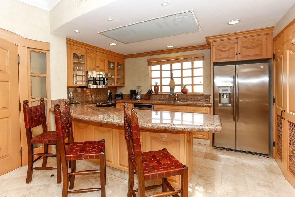 Beautiful updated kitchen with stainless appliances and granite counter tops