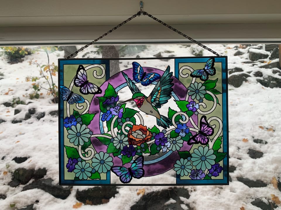 Stained glass art over kitchen sink