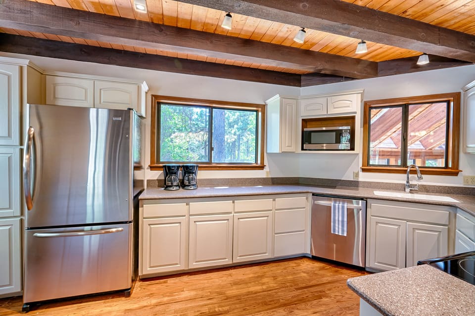 Stainless steel appliances and two coffeemakers for the caffeine lovers