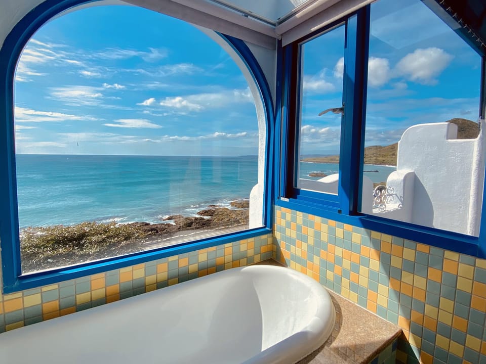 Deluxe Double Room, 1 Double Bed, Non Smoking, Ocean View | Bathroom amenities | Free toiletries, hair dryer, slippers, towels
